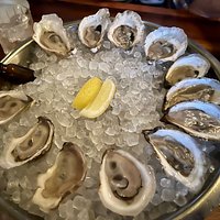 Kimball House signature dishes A wide selection of raw oysters, Absinthe service, and the Kimball House Burger.